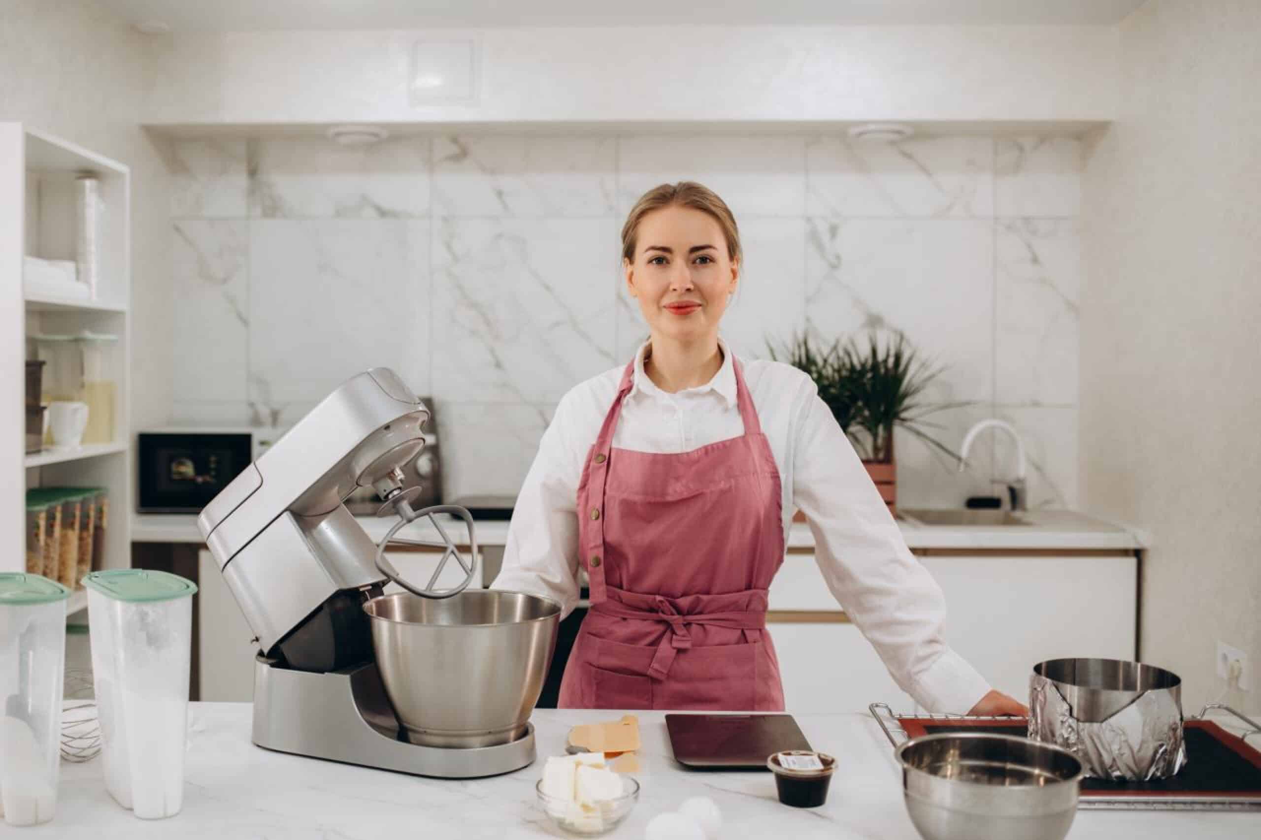 home 8 Lina Hart smiling in a cozy kitchen setting, sharing her love for easy home-cooked recipes.