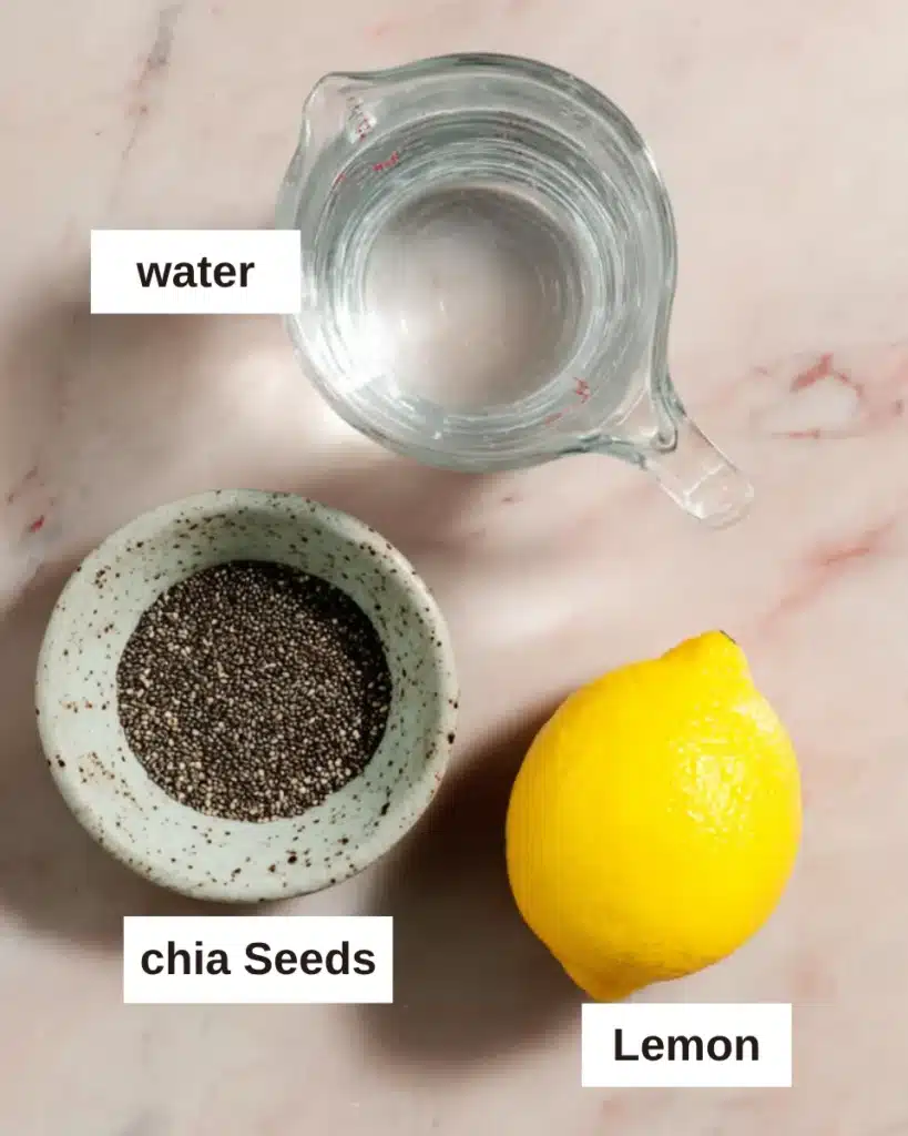 Chia Seeds Water: Easy Daily Drink for Digestion & Energy 5 Top view of chia seeds, lemon, and water for making chia seed water