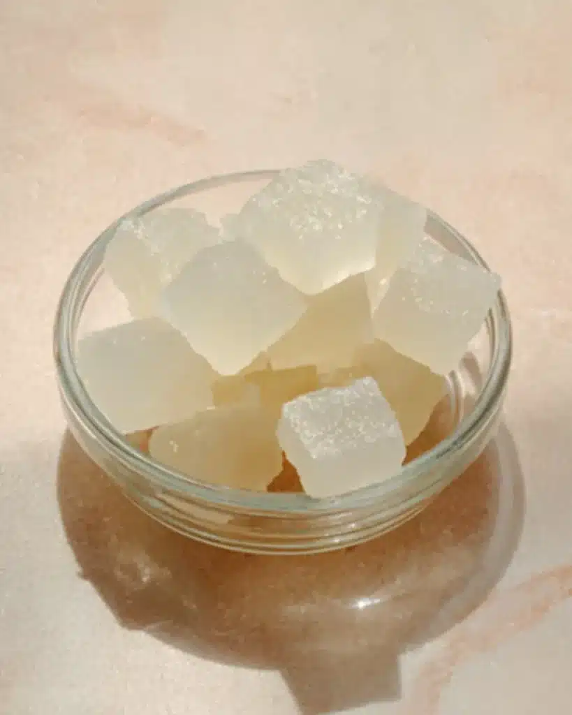 Gelatin Trick Ingredients for Satisfying, Light, Protein-Rich Snacking 2 Soft translucent cubes made with key Gelatin Trick Ingredients in a clear bowl