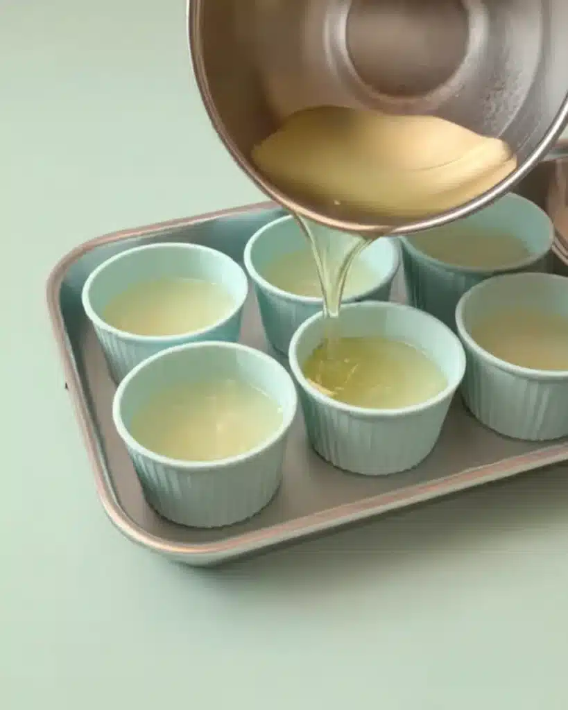 Bariatric Gelatin Recipe portioning into silicone cups for easy meal prep and weight loss snacks