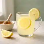 Master cleanse recipe lemon detox drink recipe card image with honey and lemon slice
