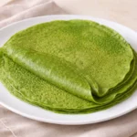 Spinach Tortillas Recipe with Easy Gluten Free Wraps 10 Stack of soft spinach tortillas on a plate with bright green homemade gluten free wraps